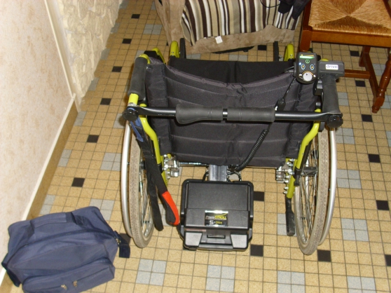 fauteuil roulant avec motorisation