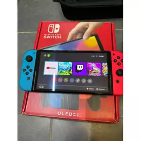 Nintendo Switch Oled + 2 jeux + manette