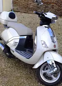 Échange scooter style vespa (dolce vita)