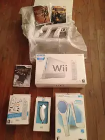 Console Wii + télécommande + jeux + acce