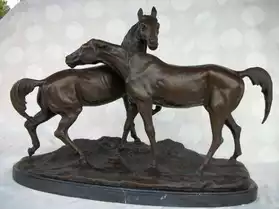 statue en bronze avec 2 chevaux