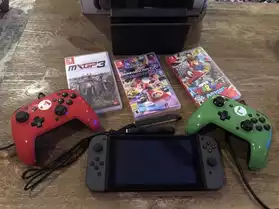 Nintendo swicth avec 3 jeux envoie