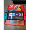 Nintendo Switch Oled + 2 jeux + manette