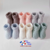 Chaussons tricot bébé revers astrakan